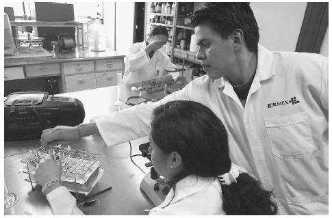 Chemistry students at the National School of Biological Science in Mexico City work with samples of anthrax in October 2001, without customary controls such as biosafety suits and ventillation hoods that are imposed by most other countries. AP/WIDE WORLD PHOTOS.