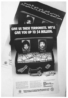 Wanted posters, released in English and Arabic in 1995 by the FBI and State Department, show two suspects wanted in the bombing of Pan AM flight 103 which exploded over Lockerbie, Scotland in 1988. AP/WIDE WORLD PHOTOS.