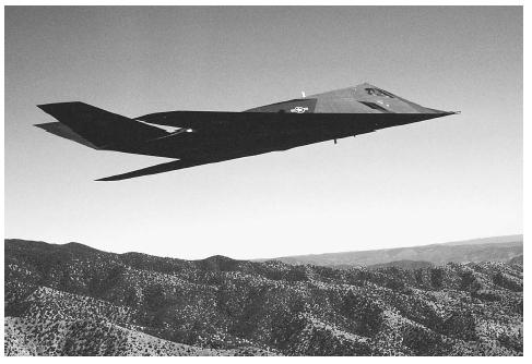An F-117A Nighthawk Stealth fighter flies over the New Mexico desert during a training mission. AP/WIDE WORLD PHOTOS.