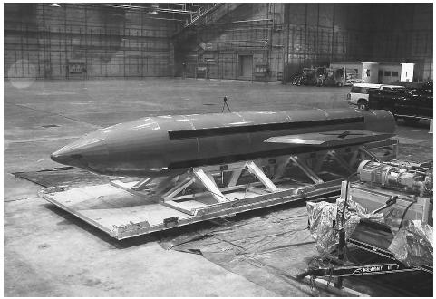 A Massive Ordnance Air Blast bomb, or MOAB, the largest conventional bomb in the U.S. weapons arsenal, is prepared for testing at Eglin Air Force Base, Florida, March 11, 2003. AP/WIDE WORLD PHOTOS.