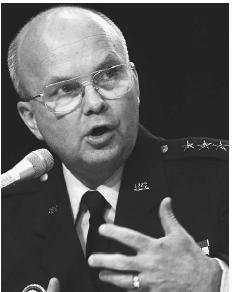 National Security Agency Director Lt. General Michael Hayden answers questions about what went wrong prior to the September 11, 2001, attacks before the Senate Select Committee on Intelligence, October 17,2002. ©REUTERS NEWMEDIA INC./CORBIS.