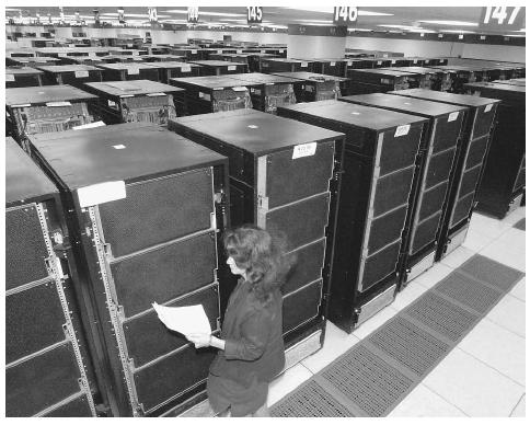 A technician monitors IBM's ASCI White in 2000, then the world's fastest supercomputer, that is capable of 12 trillion calculations per second. The Department of Energy uses ASCI White to analyze and protect the nation's nuclear weapons stockpile. AP/WIDE WORLD PHOTOS.