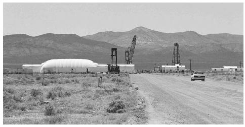 A car enters the U1a Complex, an underground facility in Nevada designed for conducting subcritical experiments to determine whether aging nuclear weapons remain reliable and safe. AP/WIDE WORLD PHOTOS.