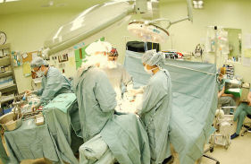 Surgeons performing operation