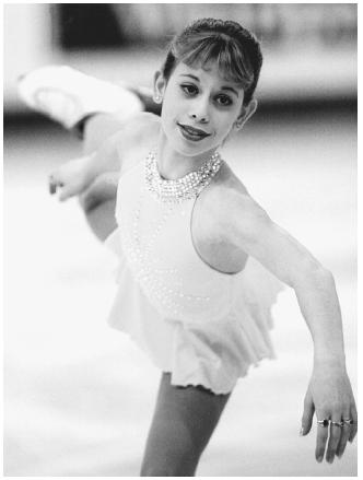 Figure skating champion Tara Lipinski took up ice skating at a young age. (Photograph by Denis Balibouse. Reuters/Archive Photos. Reproduced by permission.)