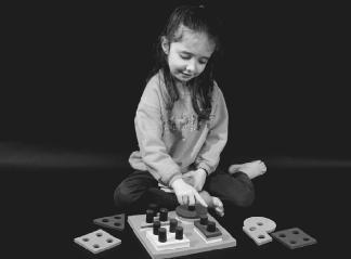 Memory games are fun for young children, and also help develop important connections in the brain. (Photograph by Robert J. Huffman. Field Mark Publications. Reproduced by permission.)