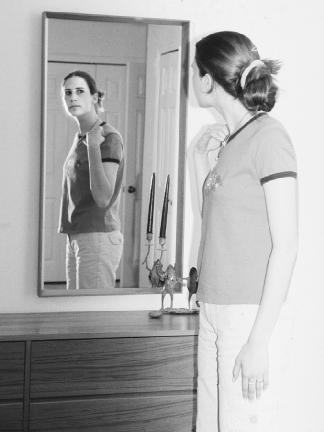 Many people with eating disorders have a distorted view of their bodies, seeing themselves as overweight when, in fact, they are not. (Photograph by Robert J. Huffman. Field Mark Publications. Reproduced by permission.)