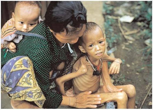 Food insecurity affects millions of people around the world, including these children in Thailand. The situation in that country and a handful of others has improved slightly, but progress is slow. [© Bettmann/Corbis. Reproduced by permission.]