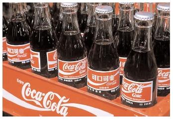 John S. Pemberton's 1886 Coca-Cola recipe contained a highly addictive stimulant extracted from coca leaves. That recipe was replaced in 1905 with one more similar to the modern beverage, which is distributed in 200 countries worldwide. [© Sergio Dorantes/Corbis. Reproduced by permission.]