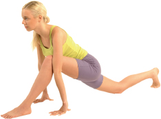 In a squatting position, take in a deep breath and extend your right leg back