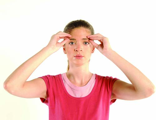 Apply pressure with your index fingers and thumbs of both hands on your eyebrows, from the center moving outward. Repeat several times