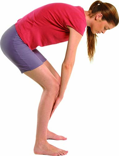 Separate the legs, bend the knees and gently tap the front of the legs